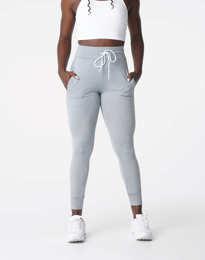 NVGTN Joggers Srebrne | 74921-MVYT